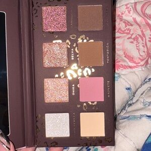 Desnuda Eyeshadow Palette brand new. I did swatch three of the colors.